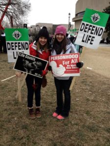 Sophomore year waiting on the Mall for the March to begin.